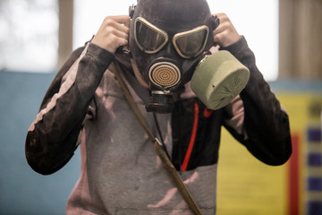 Man with protective mask and protective clothes, coronavirus protection