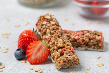 Obraz na płótnie Canvas Granola bar. Healthy sweet dessert snack. Cereal granola bar with nuts, fruit and berries. Super food breakfast bars. 