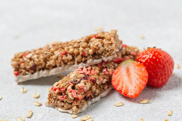 Cereal granola bar with nuts, fruit and berries. Granola bar. Healthy sweet dessert snack. 