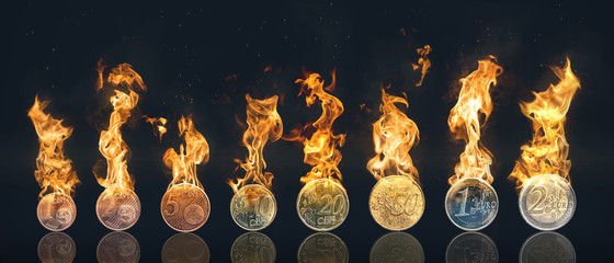 Row of Euro coins on fire