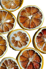 Dried lemons on a white background. Top view. Isolated.
