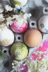 White eggs in the cardboard box, prepared for decorating; Easter background