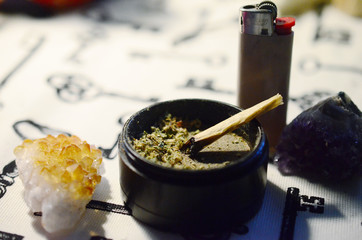 Medical Marijuana joint, flower in grinder. Healing crystals and marijuana. Citrine cluster, and...