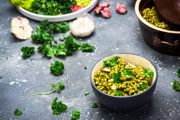 Bucketwheat Groats with Kale and Garlic. Healthy Plant Based Vegetarian Diet. Clean Eating. Food Background