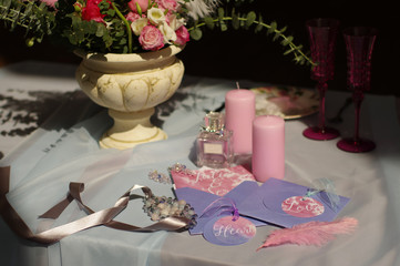 On the table are wedding accessories.