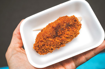 Deep fryed oyster street food at tsukiji market.