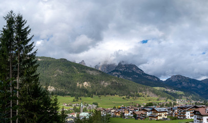 Fototapeta na wymiar Large panoramic view of Pozza di Fassa, a commune in Trentino at the northern Italia