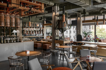 Interior of modern cafe in loft style - obrazy, fototapety, plakaty