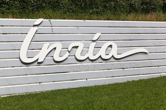 Grenoble, France - June 15, 2019: INRIA sign on a wall. The National Institute for Research in Computer Science and Automation (INRIA) is a French national research institution