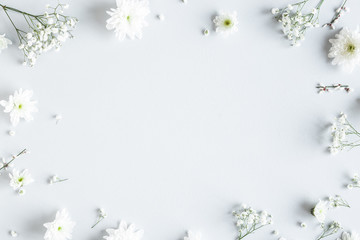 Flowers composition. White flowers on gray background. Spring concept. Flat lay, top view, copy...