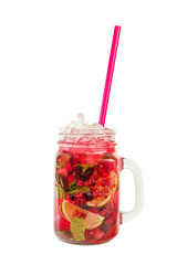 Red cocktail in a tall glass with fine ice and lemon, lime, mint leaves and pink straw, Side view Isolated white background for the menu