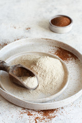 Teff flour and teff grain close up