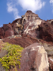 View of the cliffs of Red Beach, Santorini, Greece.
