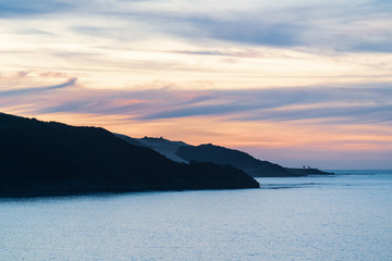 sunset over the sea at ahipara