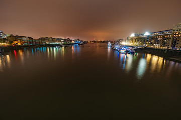 Fototapeta na wymiar View of the Butler's Wharf at night from the Tower bridge, London, England, UK, GB
