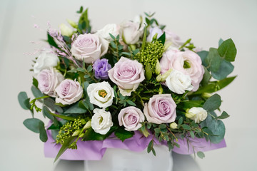 A bouquet of delicate fresh flowers in lilac tones