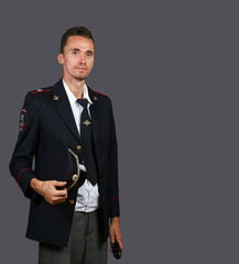Confident Russian policeman in uniform looking at camera