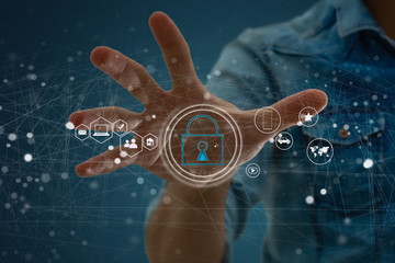 Security and Insurance Data Industry 4 Concept. Worker touched shield lock icon on virtual screen....