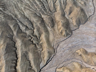 Beautiful aerial view of a lunar landscape  over the muddy volcanoes, Paclele, Berca, Buzau County, Romania