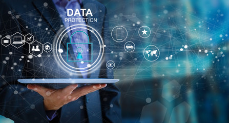 business, technology and internet concept - businessman pressing data security button on virtual...