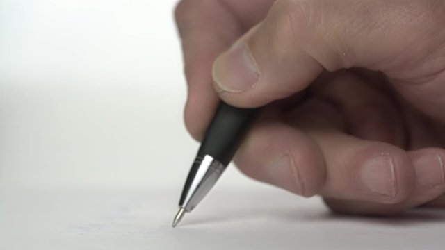 wise elderly man wrinkled right hand writes notes on paper sheet using navy ball pen extremely close view