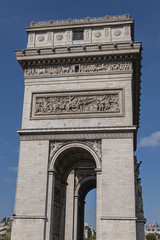 Fototapeta na wymiar Arc de Triomphe de l'Etoile on Charles de Gaulle Place, Paris, France. Arc is one of the most famous monuments in Paris.