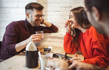 Young People Ordering Food in Fast Food Restaurant	
