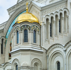Fototapeta na wymiar Gilded dome of the orthodox Sea Cathedral of St. Nicholas in Kronstadt, St. Petersburg, Russia