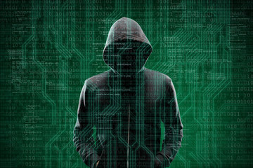 Dangerous hacker over abstract digital background with binary code. Obscured dark face in mask and hood. Data thief, internet attack, darknet fraud, virtual reality and cyber security.