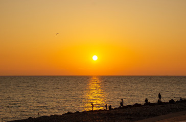 beautiful Sunny sunset on the sea. Amazing summer view on the beach.  blazing sunset landscape at...