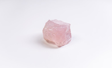 Pink rose quarz crystal isolated on white background