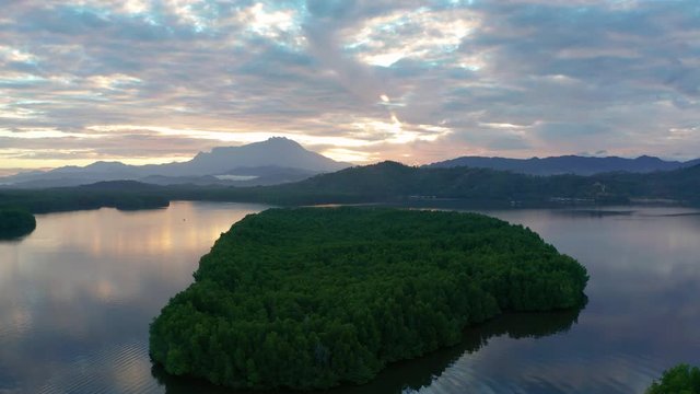 Aerial 4K footage of beautiful sunrise landscape scenery at Mengkabong River Tuaran, Sabah, Malaysia 