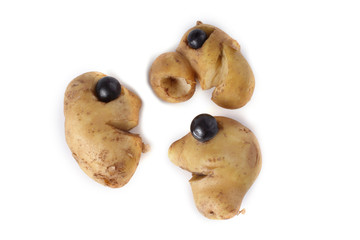 Funny potatoes in a shape of head