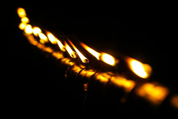 Malay tradition oil lamp or pelita selective focus during Hari Raya celebration.