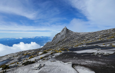 South Peak (3,921m) of Mount Kinabalu, Sabah, Malaysia.  Mount Kinabalu or Gunung Kinabalu is the 20th most prominent mountain in the world by topographic prominence.