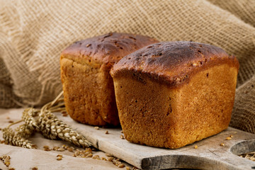 Rye bread on a cutting Board. Whole-grain rye bread