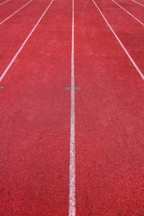 Red running track in stadium
