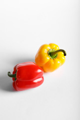 Red and yellow bell peppers. Top view
