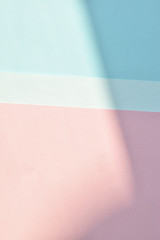 pastel ,soft two tone color or pink and blue, paper with light and shadow as texture fashion background, flat lay