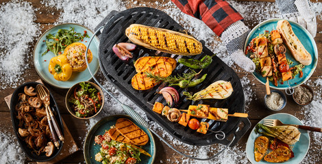 Healthy mixed vegetable winter barbecue with snow