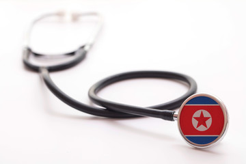North Korea healthcare concept. Medical stethoscope with country flag