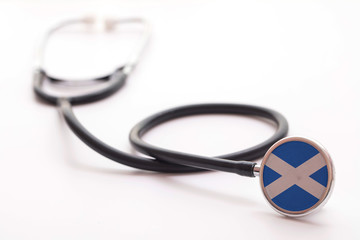 Scotland healthcare concept. Medical stethoscope with country flag