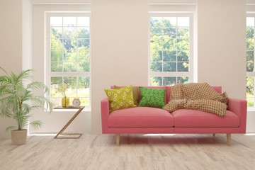 Stylish room in white color with sofa and summer landscape in window. Scandinavian interior design. 3D illustration