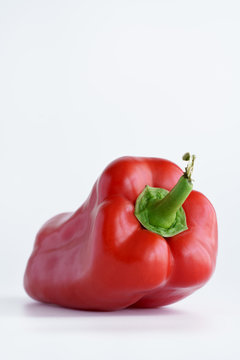 Organically grown ugly red pepper from local farmers market. High resolution, white background
