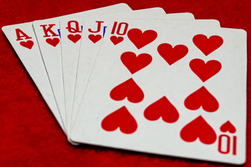 Playing cards on red background