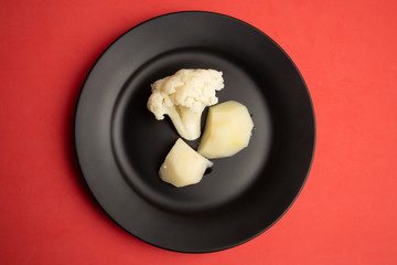 cooked cauliflower dish with potatoes