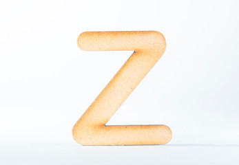 wooden alphabet letters on white background