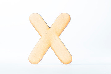 Obraz premium wooden alphabet letters on white background