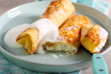 Crepe roll with soft cheese filling