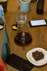Alternative manual coffee brewing. Transparent glass with coffee